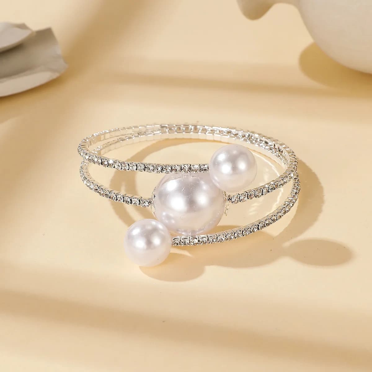 Radiant Coiled Wrap Around Bracelet Glossy Faux Pearl and Shining Rhinestone Embellishment Alloy Fashion Wrist Bangle
